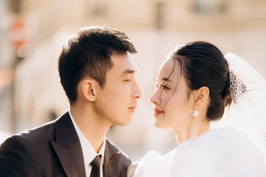 Midu mặc đầm cưới thả dáng cùng chồng đại gia ở Trời Paris